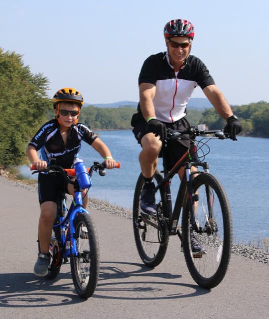 father and son biking