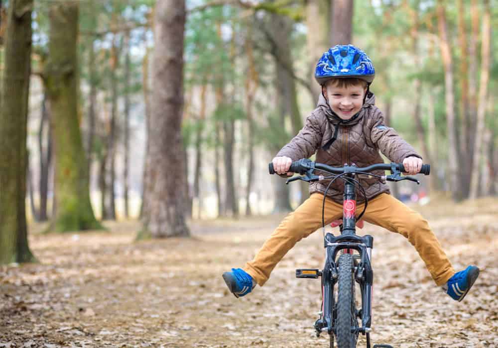 kid on bike stock photo