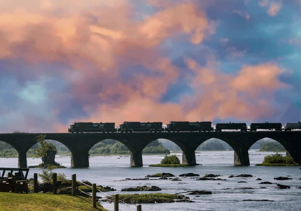 View of a train going across a rail bridge over the Susquehanna River
