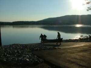 View of paddlers putting their canoe into the Susquehanna River at the Fort Hunter Access