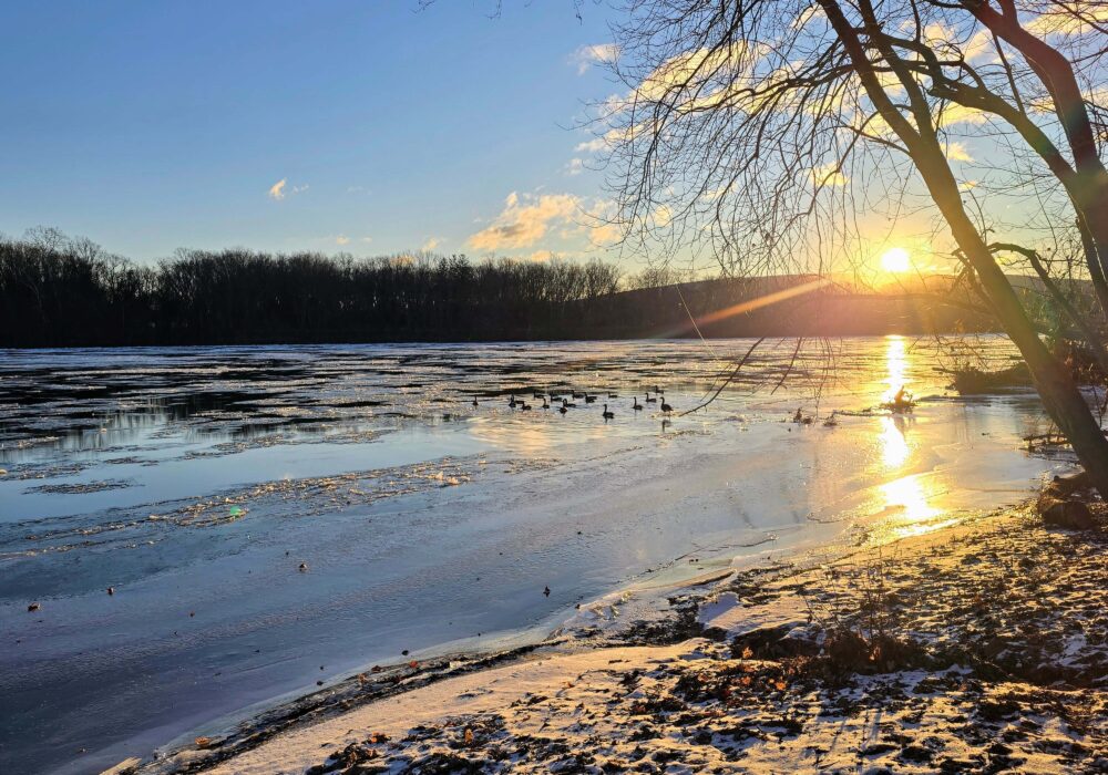 winter river scene at the golden hour