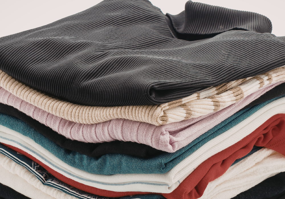 pile of folded shirts