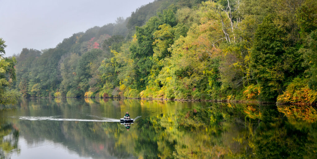 Boater fishing on the West Branch of the Susquehanna River, photo by Chet Hawkins